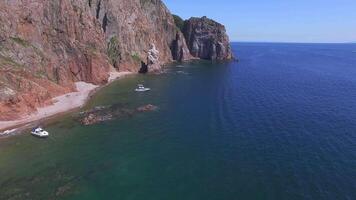 View from a drone of the coastline with a rocky coast and hight cliffs video