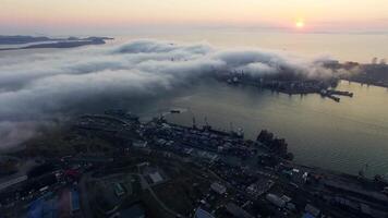 Drone view of the city and port located on the peninsula at sunset video