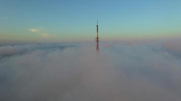 View from a drone of the bridge the fog that spreads over the ground. video