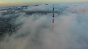 View from a drone of the bridge the fog that spreads over the ground. video