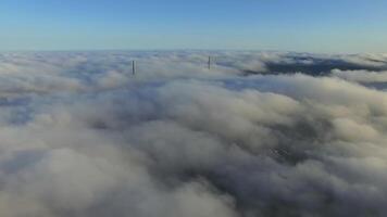 View from a drone of the bridge the fog that spreads over the ground. video