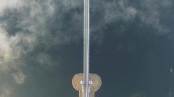 View from a drone of the bridge the fog that spreads over the ground. video