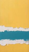 Colorful torn paper background in teal and yellow creating a striking design element photo