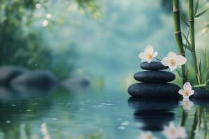 Tranquil spa setting with stacked stones and white orchids near serene water surface photo