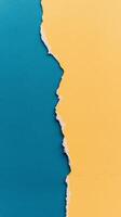 Colorful torn paper background in teal and yellow creating a striking design element photo