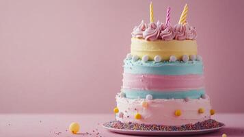 Delicious three tiered cake decorated with colorful frosting and balloons for a celebration photo