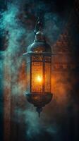 Decorative lantern illuminates a room with swirling smoke at dusk photo