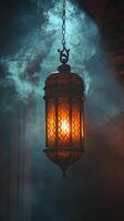 Decorative lantern illuminates a room with swirling smoke at dusk photo