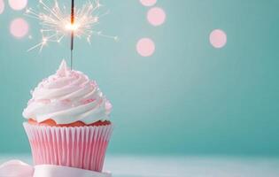Sparkling cupcake celebration with colorful sprinkles and ribbon on blue background photo