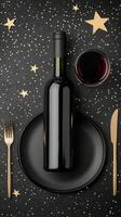 Elegant holiday dinner setting with wine and festive decorations on a dark table photo