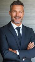 Confident businessman in formal attire smiling in modern office setting photo