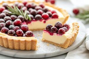 Festive cranberry tart with creamy filling and fresh rosemary decoration ready to serve photo