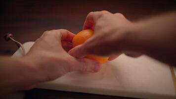 A Vibrant Orange Fruit Perfectly Positioned on an Elegant Marble Surface, Highlighting Its Appeal video