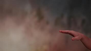 An Abstract Hand Gesture Set Against a Bright and Colorful Background of Various Hues video