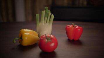 Vibrantly Colorful Bell Peppers and Fresh Tomato Arranged on a Rustic Wooden Table video