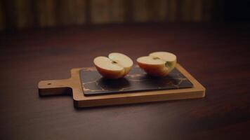 An Elegant and Beautiful Display of Freshly Sliced Apples on a Wooden Cutting Board video