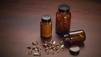 A Variety of Assorted Pills and Supplements Laid Out on a Wooden Surface for Display video