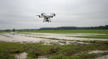 Advanced drone surveying flooded farmland for environmental monitoring and analysis photo