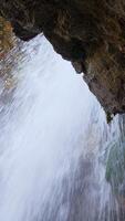 A Serene Waterfall Degrees Cascading Beautifully Over A Rocky Cliff Into A Tranquil Pool Below video