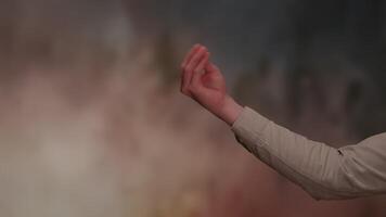 An Abstract Gradient Background Featuring a Unique Hand Gesture in Artistic Expression video