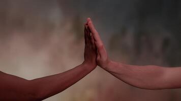 Hands Raised in Unity Against a Colorful Background Inspiring Hope and Togetherness video