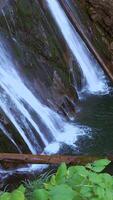A Tranquil Waterfall Flowing Gracefully into a Serene and Picturesque Pool of Water video