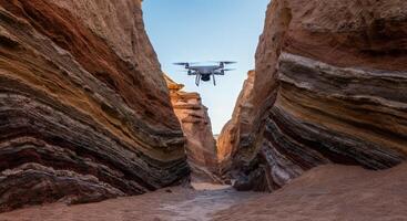 A drone navigating majestic sandstone canyons under blue sky for aerial photography exploration photo
