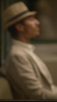 An Elegant Individual Dressed in Timeless Classic Attire and Accessories with Charm and Style video