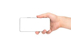 A man's hand holds a smartphone with a white screen. Hand isolated on white background. Close-up. photo
