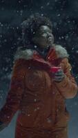 Cozy Winter Moments Embracing and Truly Enjoying the Snowfall while Wearing an Orange Jacket video