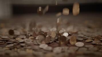 A stunning spectacle of coins falling on a surface amidst active economic activity video