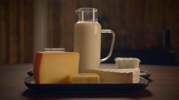 A delightful assortment of dairy products, featuring an arranged cheese and milk display video