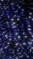 An Abstract Blue and White Bubble Pattern Set Against a Dark Background, Evoking Depth and Mystery video