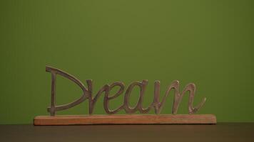 Inspiring Dream Sign on a Vibrant Green Background for Positive Energy and Good Vibes video