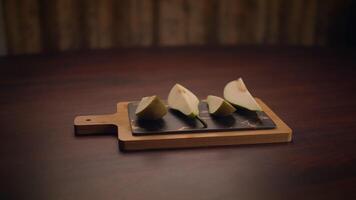 Artisan Cut Fruits Arranged Beautifully on a Rustic Serving Board for an Elegant Display video