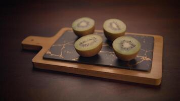 Beautifully arranged Fresh Kiwi Halves placed on an Elegant Serving Board ready to enjoy video