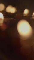 The Soft and Warm Candlelight Reflection Creates a Beautiful Illumination in a Dark Atmosphere video