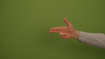 A hand gesture stands out against a vibrant green background, showcasing its artistic expression video