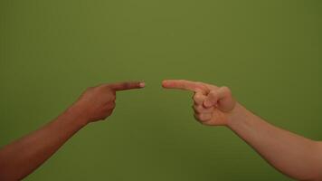 A Hand Pointing in a Creative and AttentionGrabbing Way Against a Green Background video