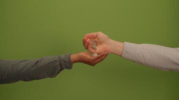 An Outstretched Hand Set Against a Vibrant Green Background, Evoking Various Concepts and Dynamics video