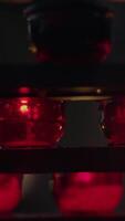 An Artistic Reflection of Red Light on Laboratory Equipment in a Unique and Abstract Style video