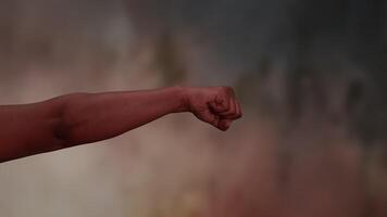 An Empowerment Gesture Set Against a Stunning Abstract Background for Visual Impact video