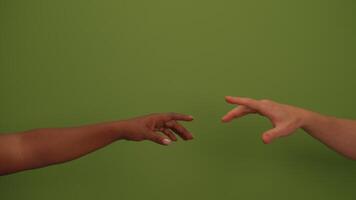 Two Hands Reaching Out Against a Green Textured Background, Symbolizing Connection and Closeness video