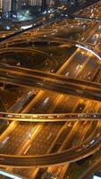 Captivating Aerial View of a Busy Urban Highway Interchange Illuminated at Night video