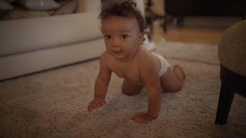 A Charming and Adorable Baby is Crawling on a Soft Rug in a Contemporary Living Room Setting video