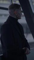 A Mysterious Figure Overlooks Modern Architecture with Intriguing Details and Features video