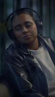 A Relaxed Young Adult Enjoys Listening to Music While in a Calm and Peaceful Environment video