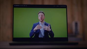A Professional Speaker is Presenting on a Screen Set Against a Green Background, video