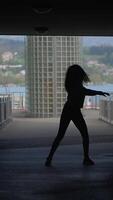 A Stunning and Dynamic Dance Silhouette Has Been Beautifully Captured in an Urban Setting video