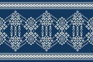 Ethnic design pixel art cross stitch motif fabric pattern blue color background wallpaper. vector